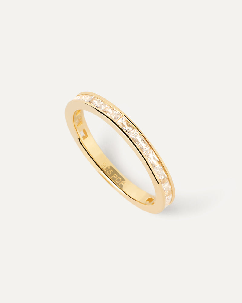 Gold-plated eternity ring set with rectangular cut white zirconia