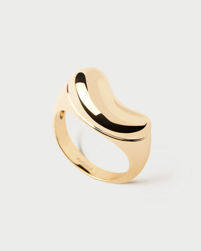 Gold-plated chunky signet ring with a wavy bean shape