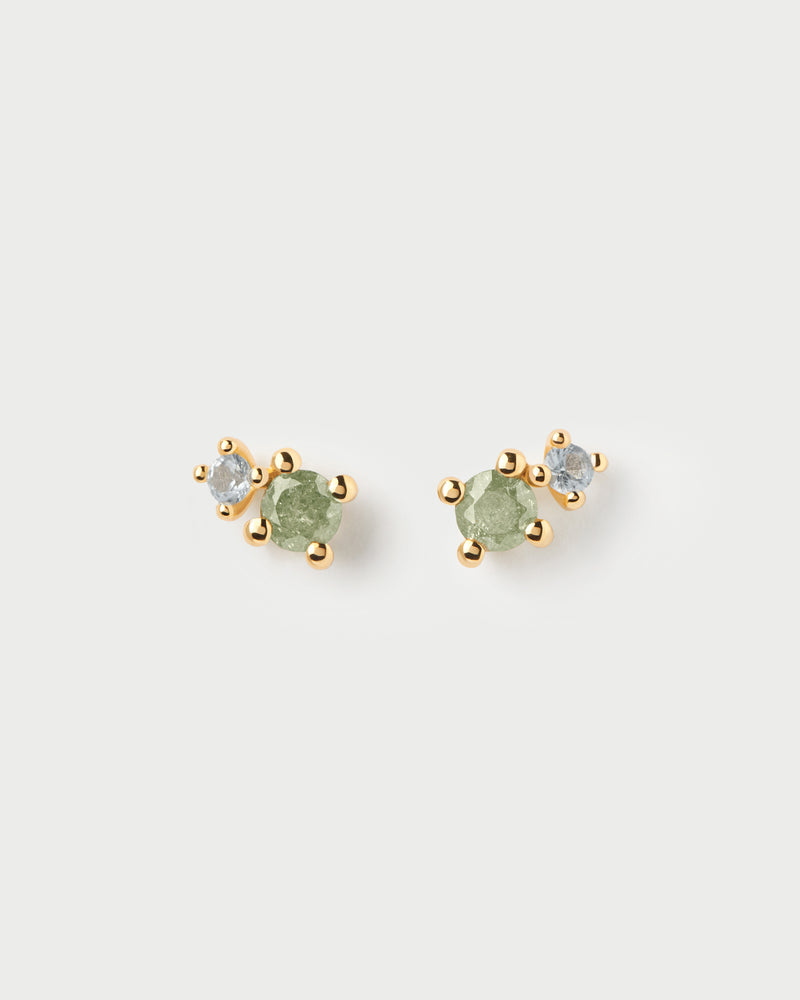 Gold-plated asymmetric two-stone round stud earrings featuring green and blue zirconia