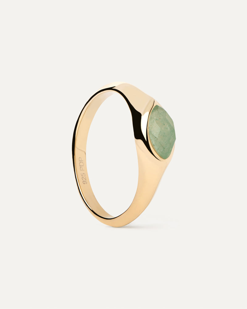 Gold-plated signet ring embellished with marquise cut green gemstone