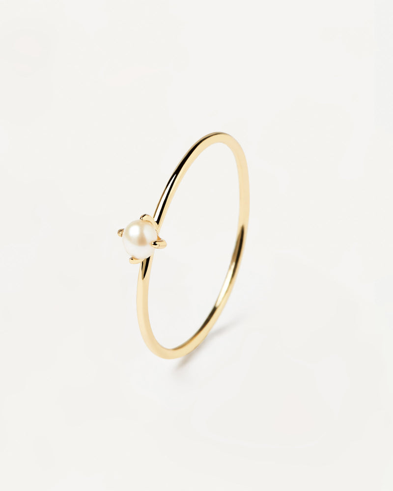 Solitary ring accented with a freshwater cultured pearl