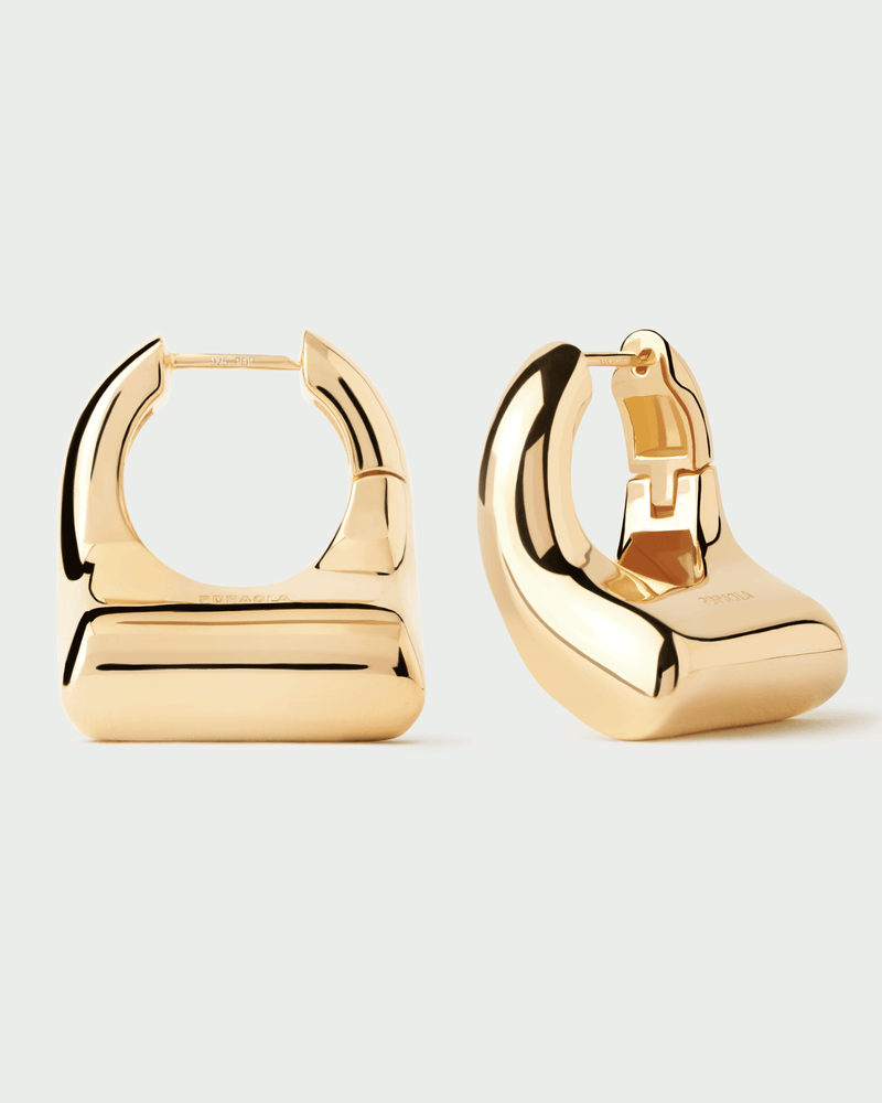 Gold-plated oversized geometric hoop earrings with a wavy bean shape